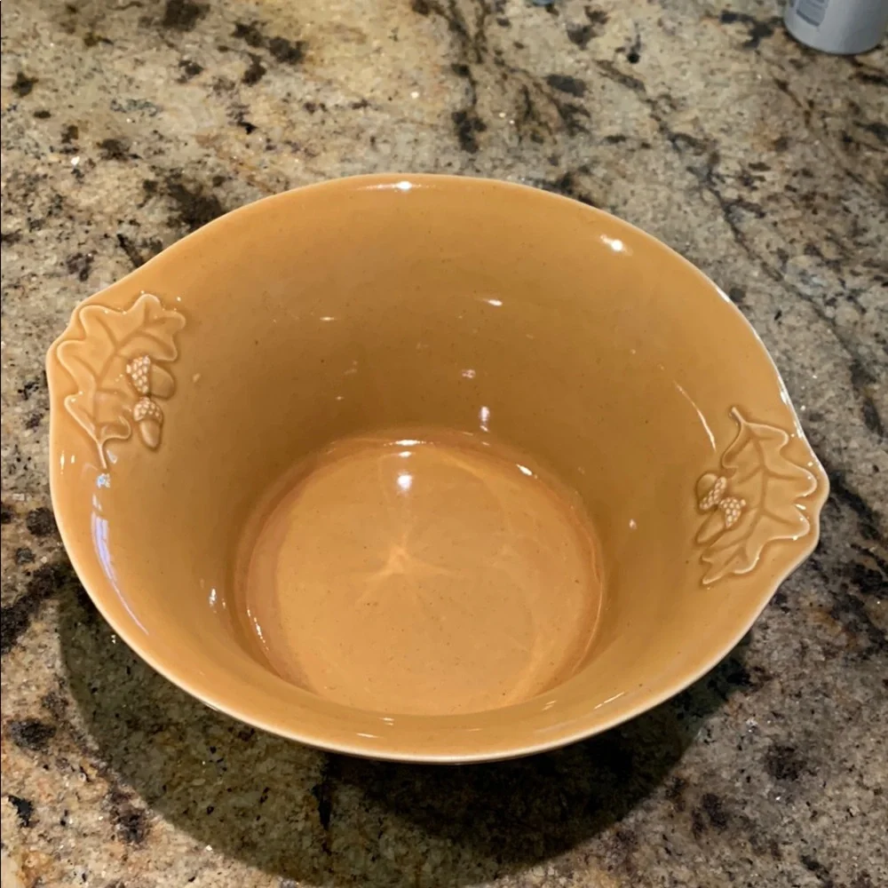 Crate & Barrel large bowl. Golden yellow.